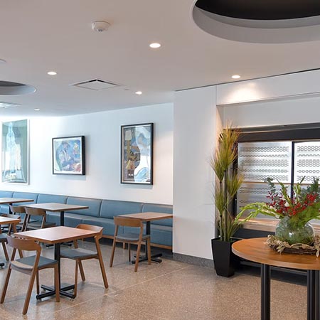 Chapter IV tables and chairs near entrance