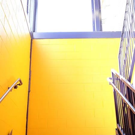 Baby Cake Stadium yellow stairwell
